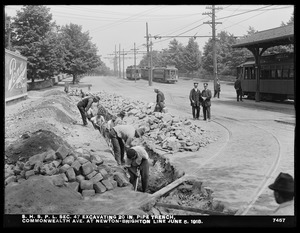 Distribution Department, Southern High Service Pipe Lines, Section 47, excavating 20-inch pipe trench, Commonwealth Avenue at Newton-Brighton line, Brighton; Newton, Mass., Jun. 5, 1918