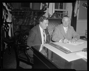 Governor shown with Insurance Commissioner Francis J. DeCelles