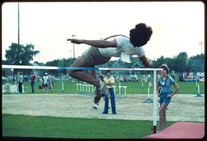 High jumper at track and field event, Somerville, Massachusetts