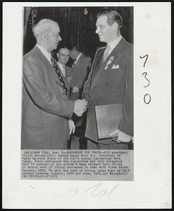 New York – Handshake for Tobin – CIO President Philip Murray (left) shakes hands with U.S. Secretary of Labor Maurice Tobin at the CIO’s annual convention here today. Tobin addressed the convention and told delegates that 45 percent of the nation’s wage earners have failed to obtain cost of living increases in step with rises since January 1950. He said the cost of living index went up 10.1 percent between January 1950 and June 1951.