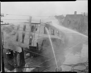 Fire collapses building