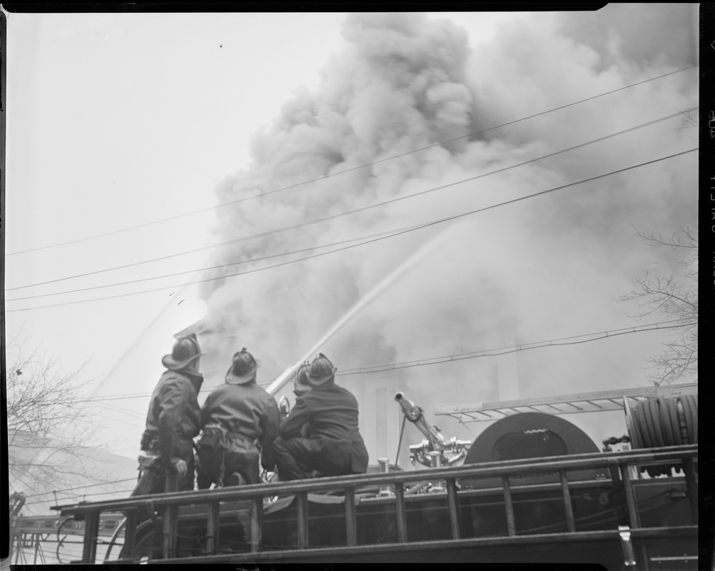 Ladder truck fighting fire Digital Commonwealth