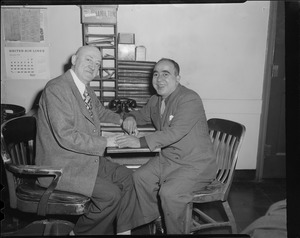 Two men in Herald offices