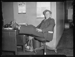 L.J. [Leslie Jones] at his desk at the Herald
