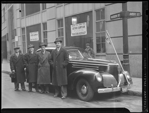 Herald men including L.J. [Leslie Jones] pose with marathon car