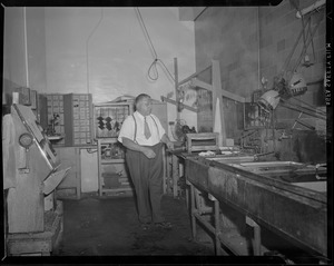 Man in the photo printing room, Boston Herald