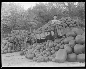 L.J. [Leslie Jones] family - overflowing pumpkin carts - Chuck & Sue, grandchildren