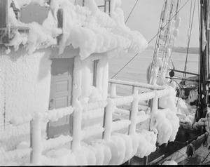 Ice covered ships in harbor - "Covena"
