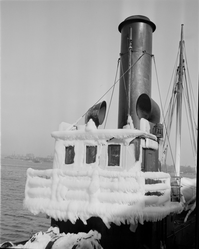 Ice covered ships in harbor - "Covena"