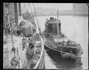 The "Sea Bee" fueling "Adventure" - Fish Pier, S. Boston