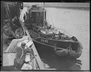 The "Sea Bee" fueling "Adventure" - Fish Pier, S. Boston