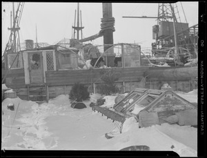Derelict at frozen wharf