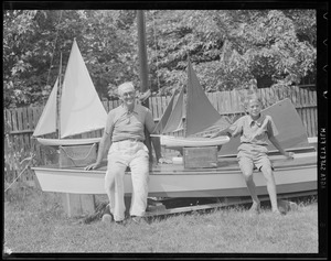 Man & boy with miniature boats
