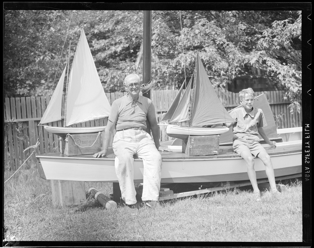 Man & boy with miniature boats