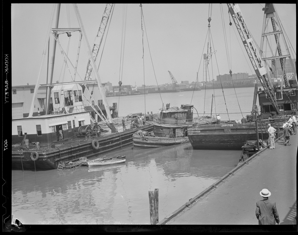 Pulling up sunken tug "Eileen Ross" at T-Wharf