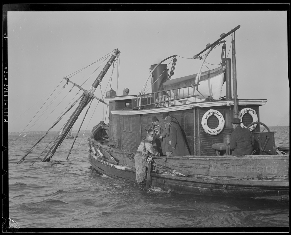 Tug "Betsy Ross" attending to sunken ship "O'Hara"