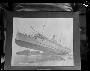 Photo of the wreck of the Princess May that hangs at Boston Y.C., Rowes Wharf