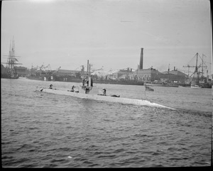 Submarine coming into navy yard