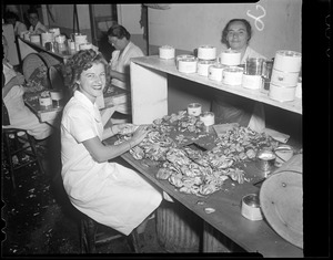Women working on catch of crabs