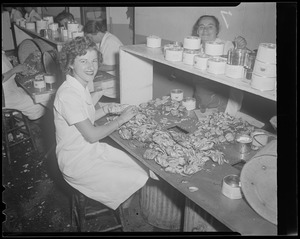 Women working on catch of crabs