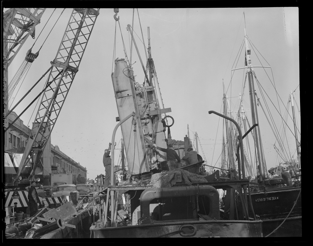 New engine going aboard trawler "Atlantic" at fish pier, South Boston