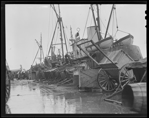 Waterfront: Pushcarts on the wharves (fishing vessels)