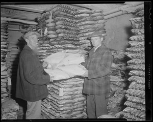 Two men in freezer, Commonwealth Pier Cold Storage Co.