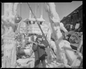 Knocking ice off trawler