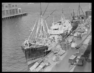 Ice covered trawler Red Jacket at fish pier