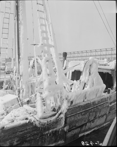 Fishing boats covered with ice in Boston Harbor