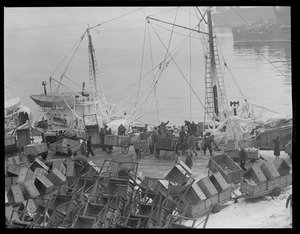 Ice-covered fishing trawler "Bonnie Lou" at fish pier