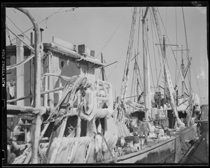 Ice-covered trawlers