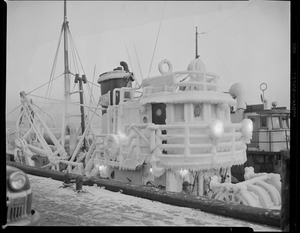 Ice covered fishing trawler "Cambridge" at fish pier