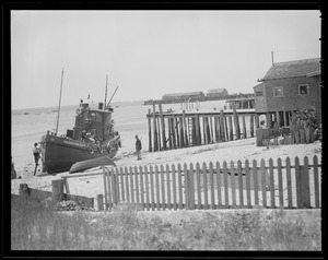 Gas boat "Provincetown Socony" on shore in Provincetown