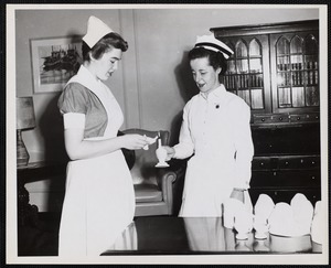 Lighting candles for Faulkner Hospital School of Nursing graduation