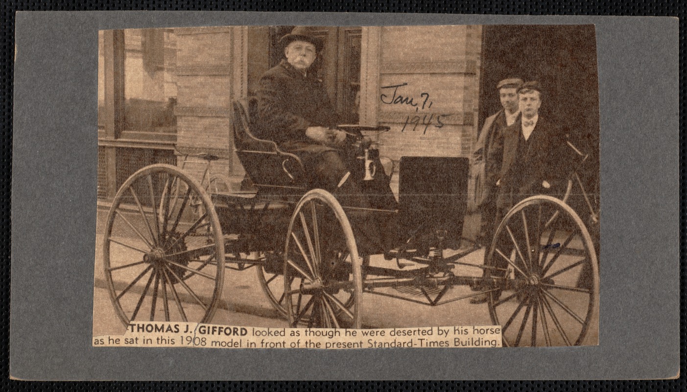 Thomas J. Gifford in early auto in front of Standard Times building