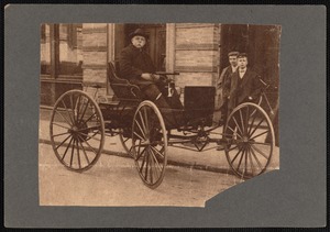 Thomas J. Gifford in early auto in front of Standard Times building