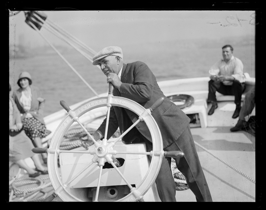 Capt. Ben Pine at helm of Gertrude L. Thebaud