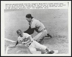 Dodger's Maury Wills slides safely under the tag of Giant catcher Tom Haller for the 1st run of the game in the first inning. Wills started the inning with a triple to left center and scored on Jim Gilliam's sacrifice fly.