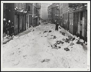 Clark St - No End. At 5:30 PM no plow has been through sidewalks cleared by householders who piled snow in street up to 5 feet. Kids built snow block fort in middle.