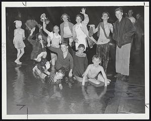 Storm-Made Pool in Charlestown-Typical of many streets in Greater Boston during last night's storm was Vine street, Charlestown, where children reveled in the temporary wading pool.