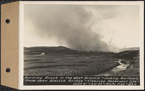 Contract No. 61, Clearing West Branch, Quabbin Reservoir, Belchertown, Pelham, Shutesbury, New Salem, Ware (including in areas of former towns of Enfield and Prescott), burning brush in the west branch, looking northerly from near Aldrich Bridge, Enfield, Mass., Jun. 2, 1939