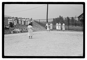 Women playing baseball
