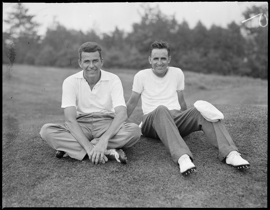 Two golfers at rest