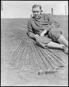 Jesse Guilford with array of clubs