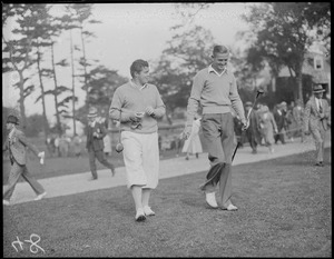 Golfers stroll on grounds of Brookline Country Club during golf championships