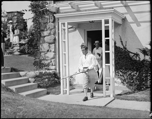 Gene Sarazen coming out of clubhouse