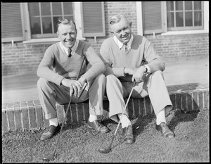 Two golfers take a break