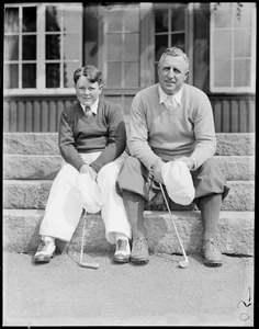 Man and boy with clubs