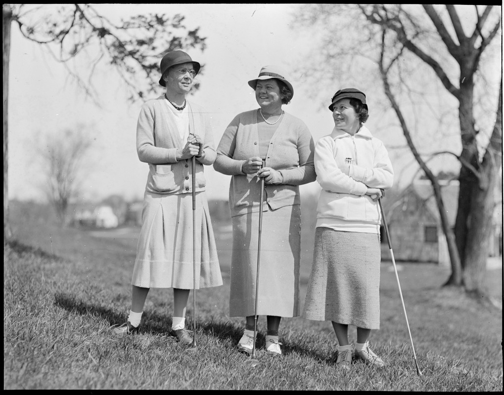 Three women golfers
